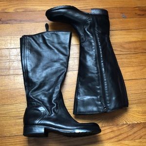 Tall black riding boots